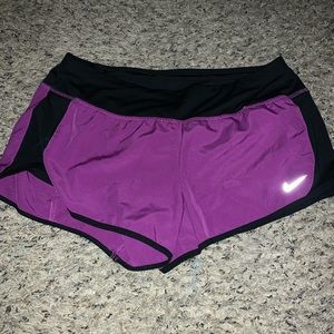 Purple Nike running shorts